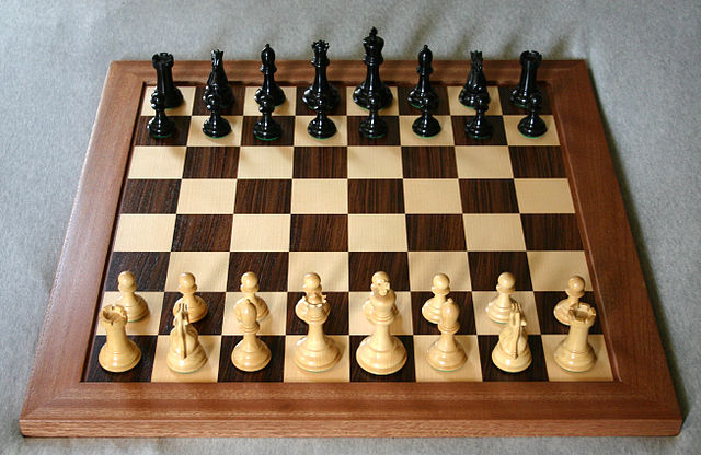 Neat Staunton Chess Board and Pieces Well Arranged in Their Starting Places